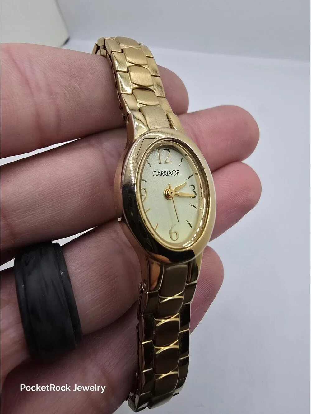 Carriage by Timex Women’s Quartz Analog Oval Gold Tone White Dial Metal Stretch